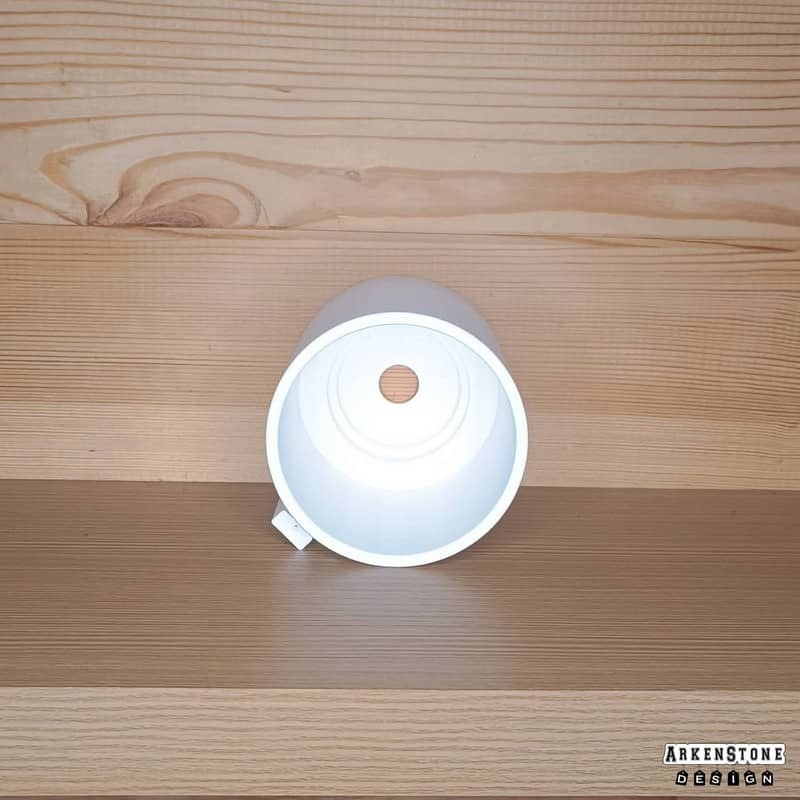 Porte boisson blanc pour flipper - vue du fond du dessus